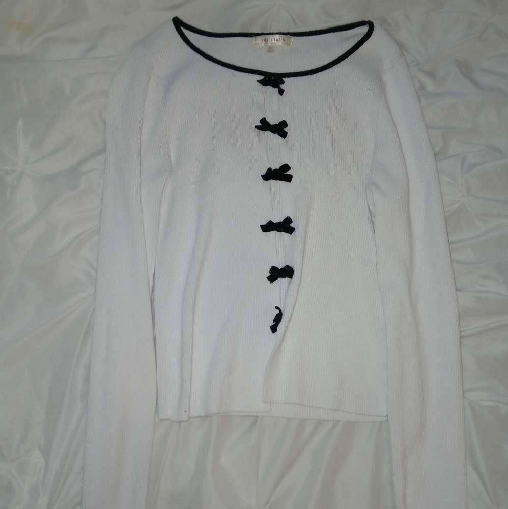 White Sweater with Black Bow Accents